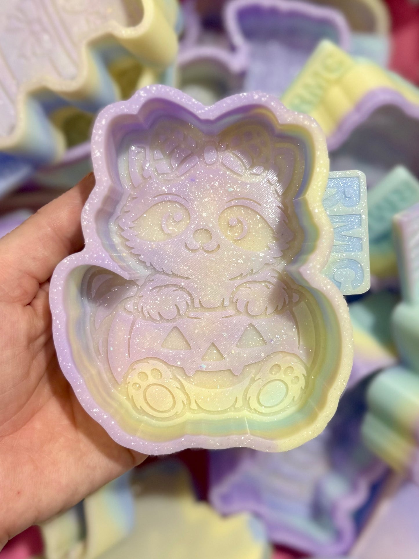 Raccoon in pumpkin
