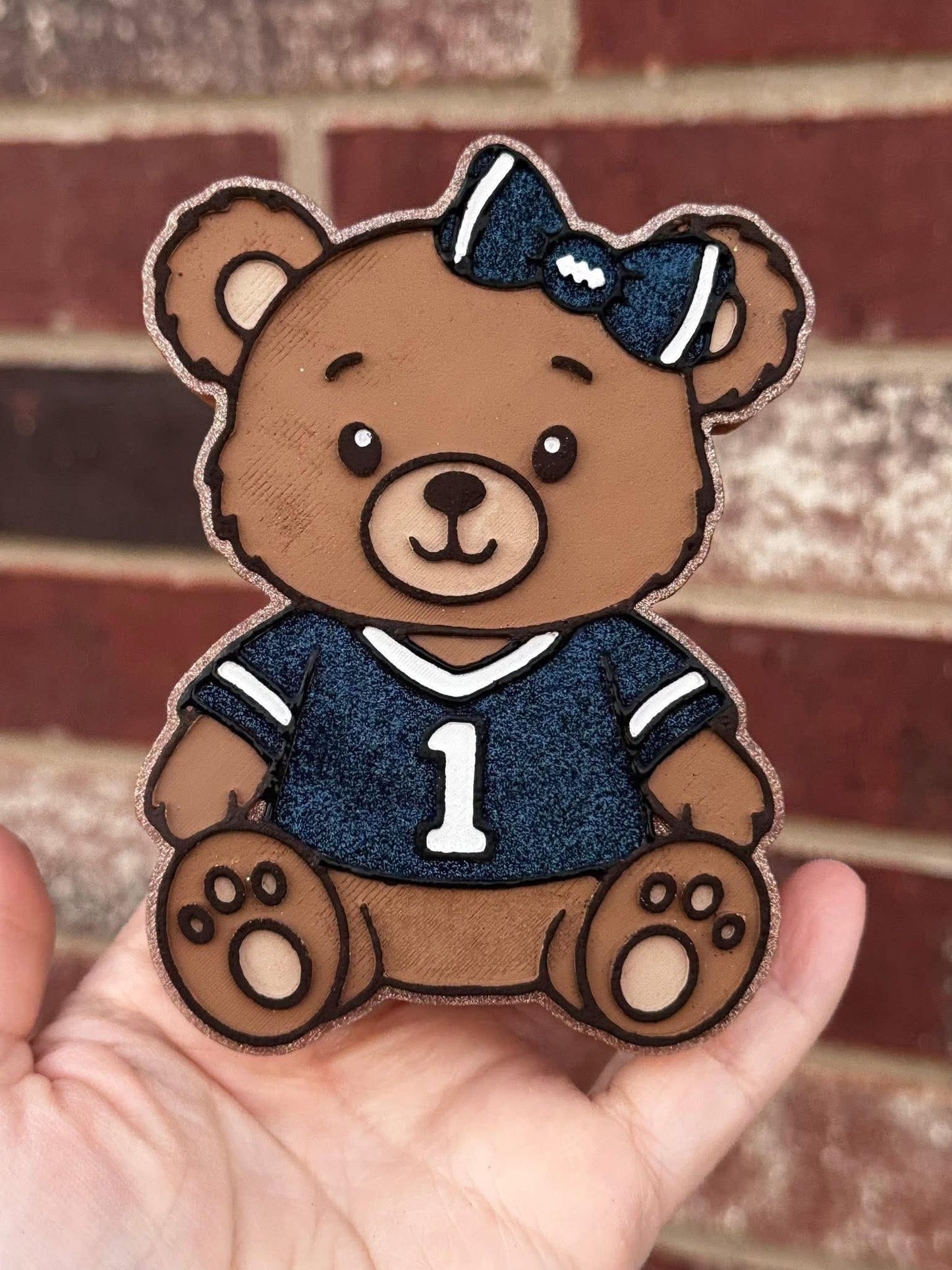 Bear in football jersey