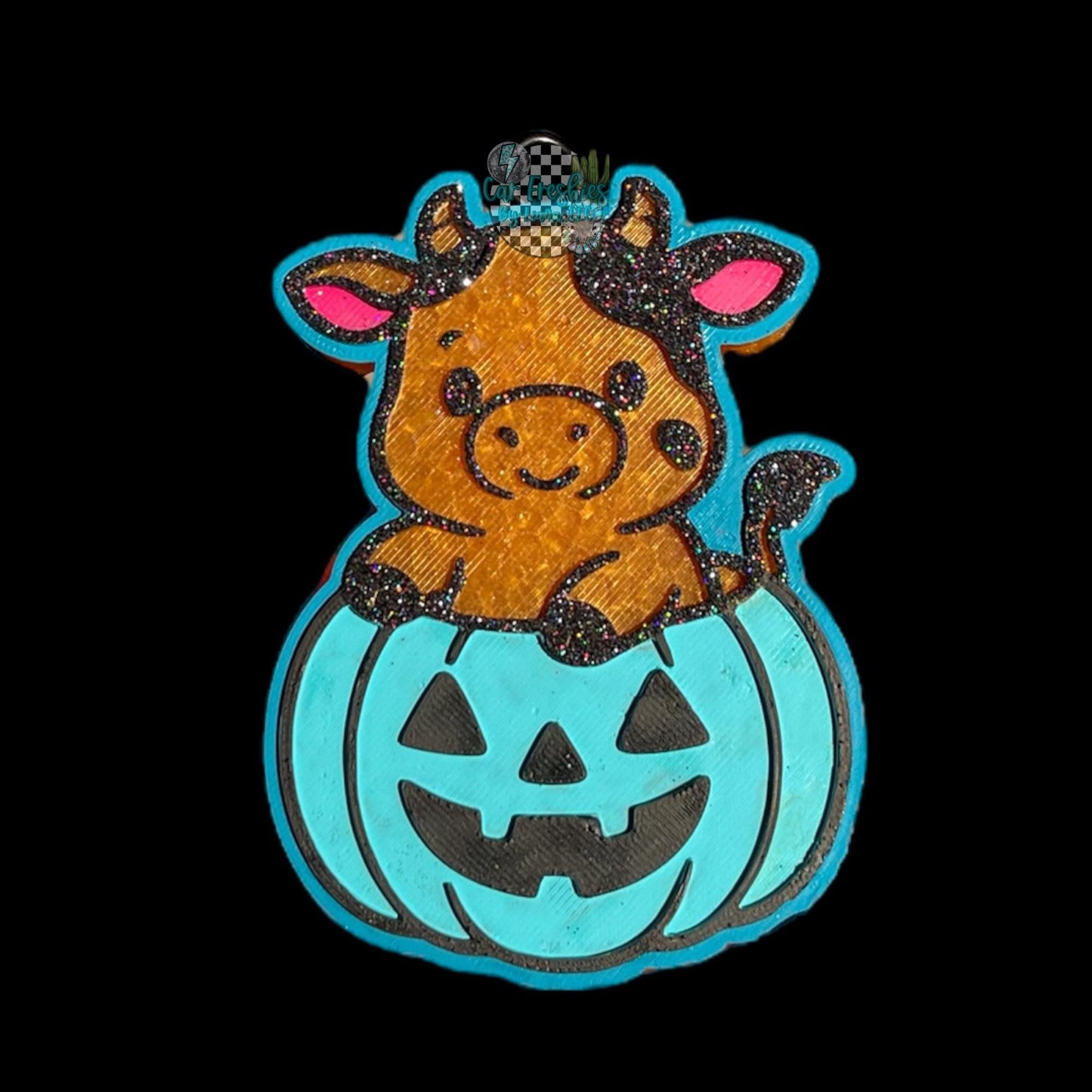 Cute cow in pumpkin