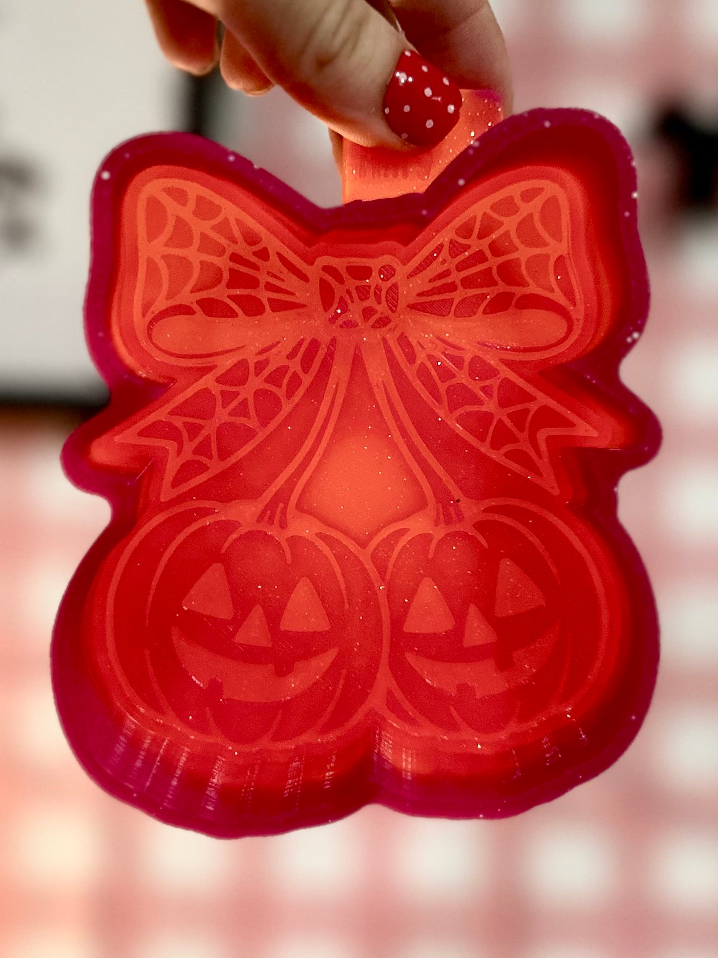 Pumpkin cherries with spider web bow