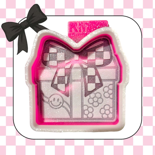 Christmas present with checkered bow