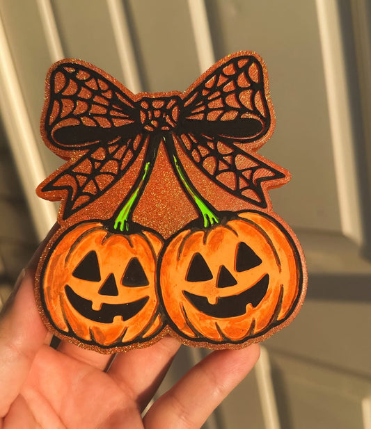 Pumpkin cherries with spider web bow