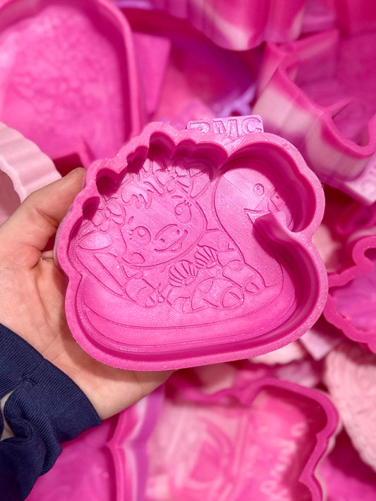 Cow with shell bikini in floatie