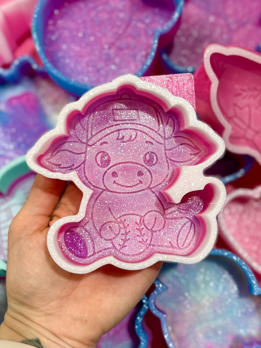 Cow with baseball / softball