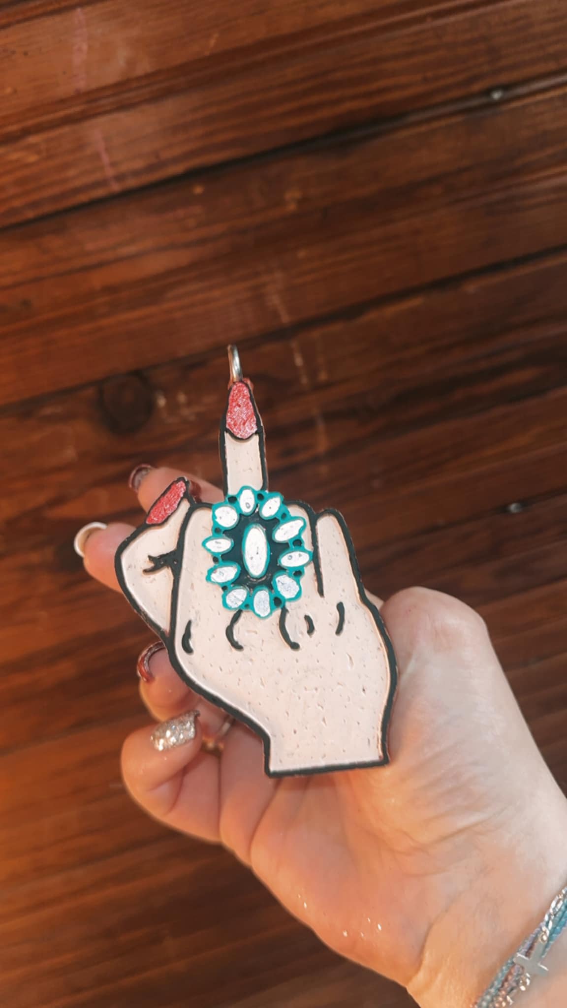 Middle finger squash blossom ring