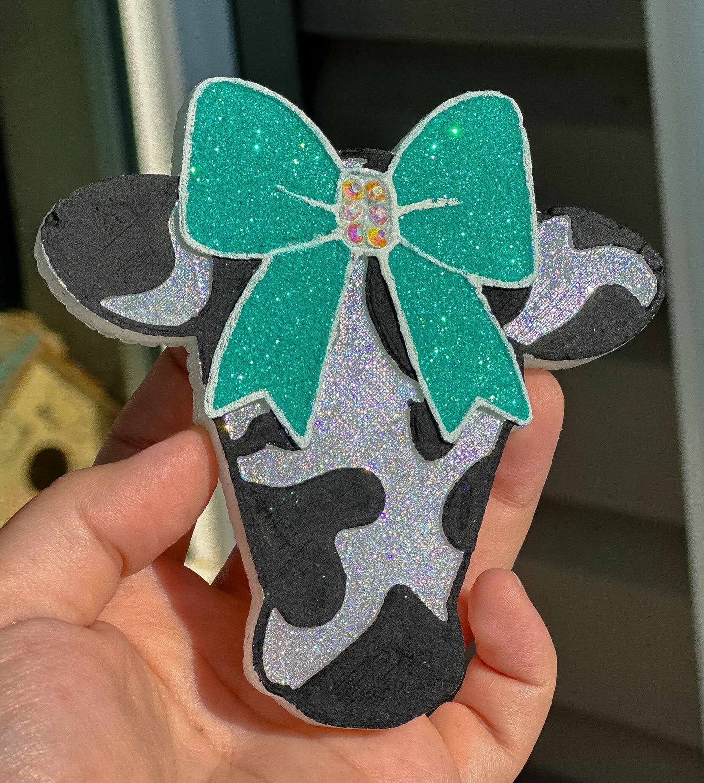 Cowprint cow head with bow