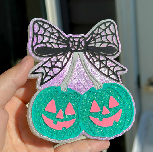 Pumpkin cherries with spider web bow