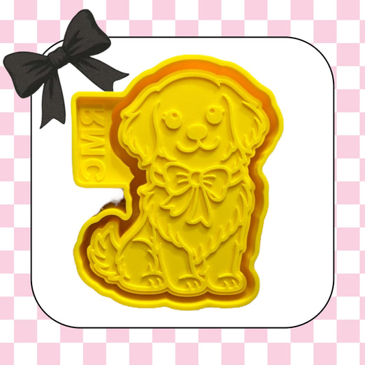 Golden retriever with bow