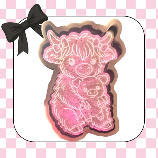 Highland cow and pig