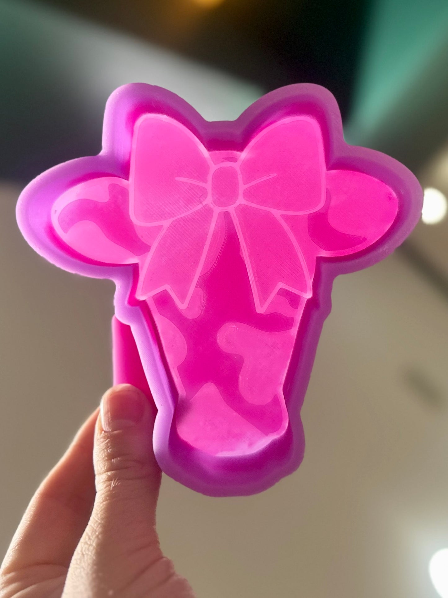 Cowprint cow head with bow