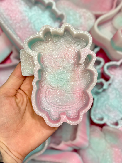 Cow with mixing bowl