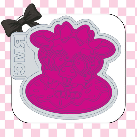 Cow in donut floatie