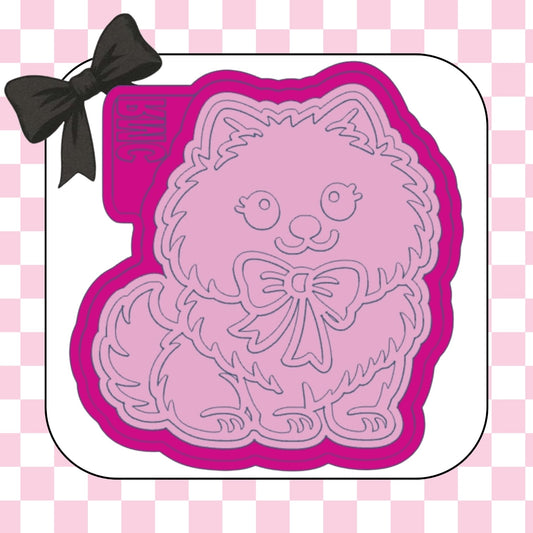 Pomeranian dog with bow